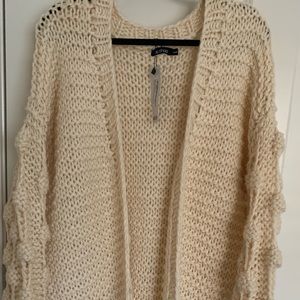 Brand new Ivory sweater